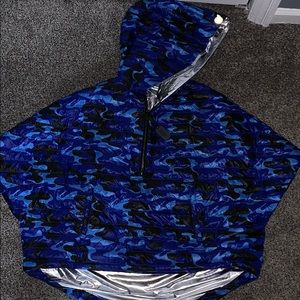 Think Royln: Cropped hi-low poncho